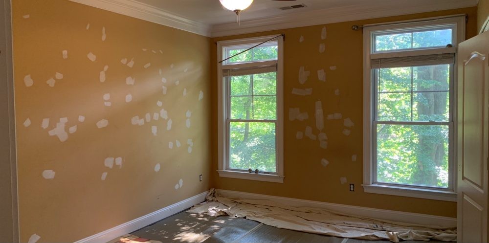 Murs avant travaux de peinture — rénovation appartement Genève